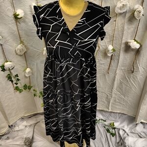 Elegant Black and White Geometric Dress